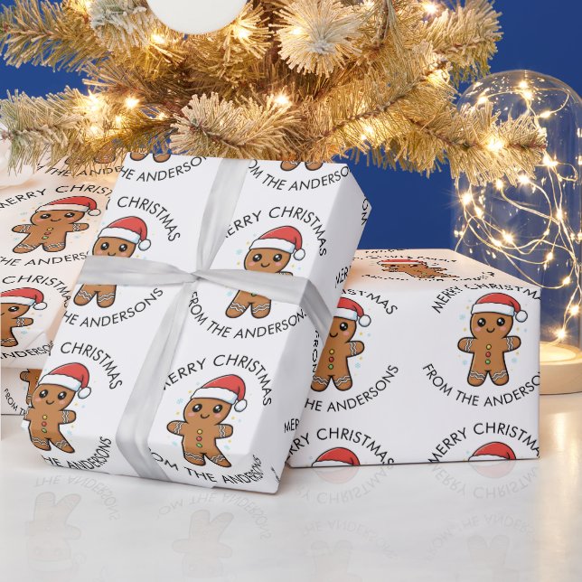 Niedlicher Gingerbrot Mann mit Weihnachtsmannmütze Geschenkpapier (Feiertage)