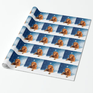 Niedlicher Golden Retriever Hund sitzt in Schneest Geschenkpapier