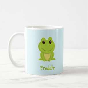 Niedlicher grüner Frosch auf blau Kaffeetasse
