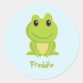 Niedlicher grüner Frosch auf blau Runder Aufkleber