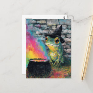 Niedlicher Hexenfrosch, der einen Regenbogenzauber Postkarte