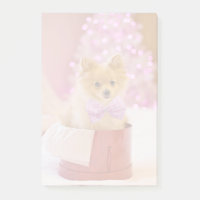 Niedlicher Hund mit Pink Bow Weihnachtsfoto