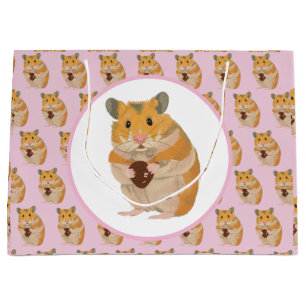 Niedlicher kleiner Hamster mit einem Ostereier, gr Große Geschenktüte