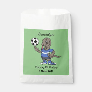 Niedlicher Komodo-Drache beim Fußballspielen Carto Geschenktütchen