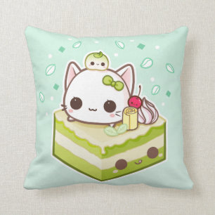 Niedlicher mochi Kitty mit kawaii Kuchen grünen Kissen