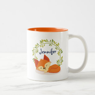 Niedlicher Orangenfox mit grünem Blätter Kranz Zweifarbige Tasse
