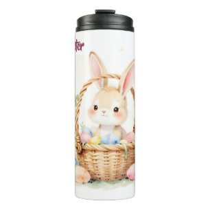 Niedlicher Osterhase im Korb mit farbenfrohen Eier Thermosbecher