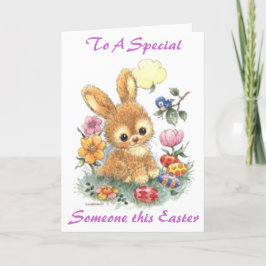 Niedlicher Osterhase mit Blumen und Eiern Feiertagskarte