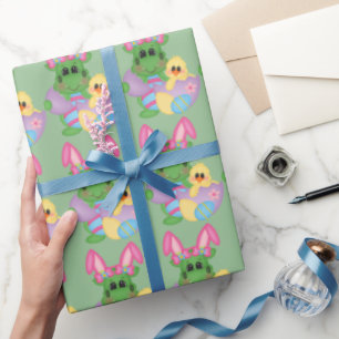 Niedlicher Ostern-Drache und Geschenkpapier