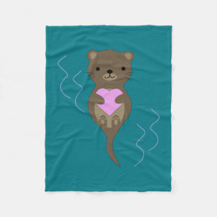 Niedlicher Otter umarmt ein rosa Herz Fleecedecke