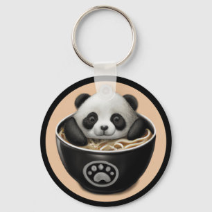 Niedlicher Panda-Bär, der in einer Schüssel Ramen  Schlüsselanhänger