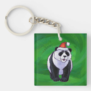Niedlicher Panda-Bär in Weihnachtsmannmütze auf Gr Schlüsselanhänger