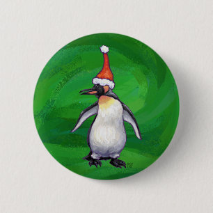 Niedlicher Pinguin in Weihnachtsmannmütze auf Gree Button