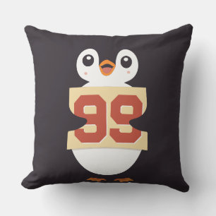 Niedlicher Pinguin mit einem Schild Kissen