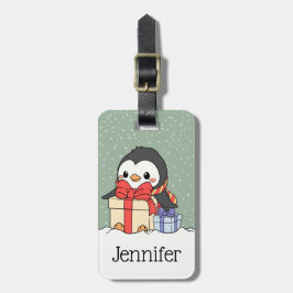 Niedlicher Pinguin mit Weihnachtsgeschenken im Sch Gepäckanhänger