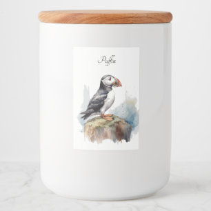 Niedlicher Puffin auf einem Felsen in Aquarell Lebensmitteletikett