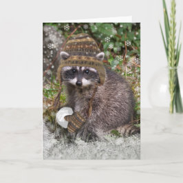 Niedlicher Raccoon mit Fäusten und Schneeball Feiertagskarte