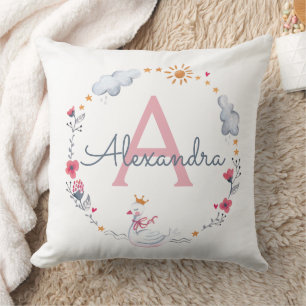 Niedlicher rosa Schwan und sonnenblumiger Kranz mi Kissen