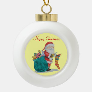 niedlicher Santa mit umhüllten Vorspeisen in grü Keramik Kugel-Ornament