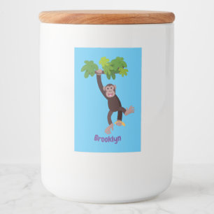 Niedlicher Schimpanse im Dschungel hängender Carto Lebensmitteletikett