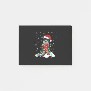 niedlicher Schnauzer-Weihnachtslicht mit Weihnacht Post-it Klebezettel