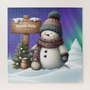 Niedlicher Schneemann am Nordpol mit Nordlichter Puzzle