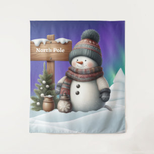 Niedlicher Schneemann am Nordpol mit Nordlichter Wandteppich
