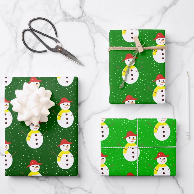 Niedlicher Schneemann und grüner Schnee Geschenkpapier Set (Vorderseite)