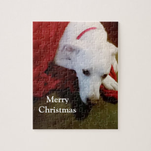 Niedlicher schneeweißer Welpenhund mit Weihnachten Puzzle