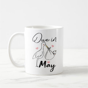 Niedlicher Schwan, der ein frisches Baby trägt Kaffeetasse