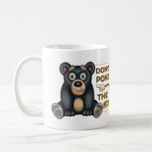 Niedlicher schwarzer Bär wirft den Bären nicht Kaffeetasse