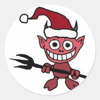Niedlicher Teufel trägt Weihnachtshut