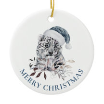Niedlicher Tigerjunge in blauer Weihnachtsmannmütz