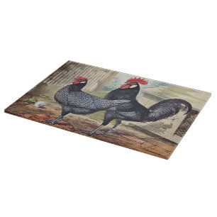 Niedlicher vintage Hahn und Henne Schneidebrett