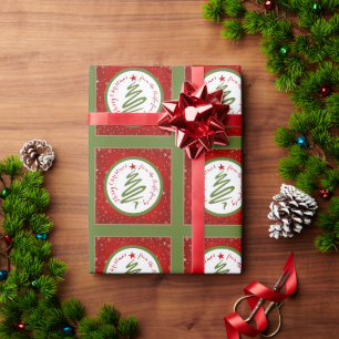 Niedlicher Weihnachtsbaum und Roter Hintergrund Geschenkpapier