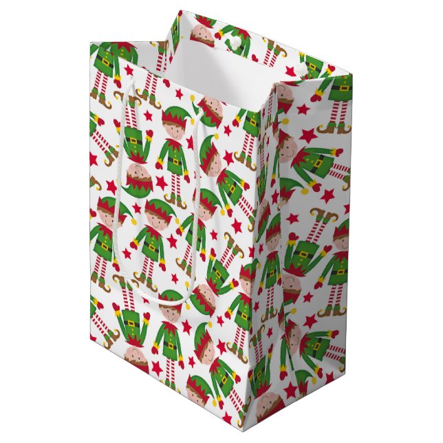 Niedlicher Weihnachtself Red Green Mittlere Geschenktüte (Vorderseite Schrägansicht)