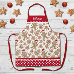 Niedlicher Weihnachtsfeiertag Gingerbread Schürze<br><div class="desc">Diese Schürze wird von einem niedlichen Pfefferkuchenmuster geschmückt. Personalisieren Sie es mit Ihrem Namen. Die Grenze der Schürze hat ein rotes und weißes Polka-Punktmuster mit Rack. Macht ein lustiges Geschenk zu Weihnachten. Entworfen für Sie von BlackBerry Boulevard.</div>