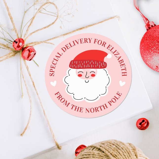 Niedlicher Weihnachtsfeiertag Sonderlieferung Nord Runder Aufkleber (A cute pink and red Santa Claus special delivery sticker. Great for decorating Christmas gifts.)