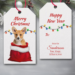 Niedlicher Welpenhund aus Corgi in Santa Bag Geschenkanhänger