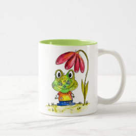 Niedlicher Whimsical Green Frosch unter einer rote Zweifarbige Tasse