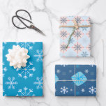 Niedlicher Winter Blue-basierte Schneeflocke Geschenkpapier Set<br><div class="desc">Dieses bezaubernde Set aus drei flachen Geschenkpapier ist mit niedlichen Schneeflocken in Weiß auf verschiedenen Blues und mehr geschmückt, die sich alle für eine schöne Geschenkschau koordinieren. Genießen Sie den ganzen Winterspass, weltlich und anders! Sie werden die Qualität dieses sich wiederholenden gemustert-Papiers, das mit den gefliesten Designs leicht zu schneiden...</div>