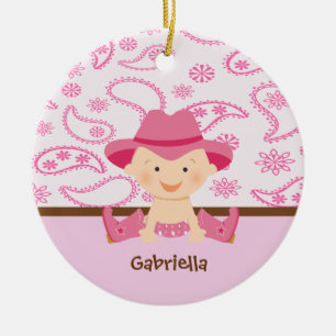 Niedliches Baby-Cowgirl in der rosa sitzenden Keramik Ornament