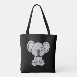 Niedliches Baby Koala mit einem Lächeln im Boden