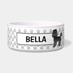 Niedliches Black Toy Poodle mit eigenem Namen des  Napf