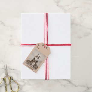 niedliches braunes Häschenkaninchen mit hübscher Geschenkanhänger
