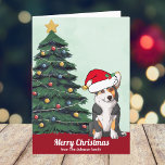 Niedliches Custom Tricolor Corgi in Weihnachtsmann Feiertagskarte<br><div class="desc">Dieser wunderschöne dreifarbige Pembroke Welsh Corgi Hund hat seinen Kopf in einem niedlichen Hut des Weihnachtsmanns gekachelt. Die Jungfrau sitzt vor einem hübschen Weihnachtsbaum,  der mit farbenfrohen Ornamenten geschmückt ist. Frohe Weihnachten ist auf der Vorderseite in schöner Kursivschrift auf dieser Haustier-Besitzer-Urlaubskarte geschrieben mit einem wunderbaren zeichn meines Lieblingshündchens.</div>
