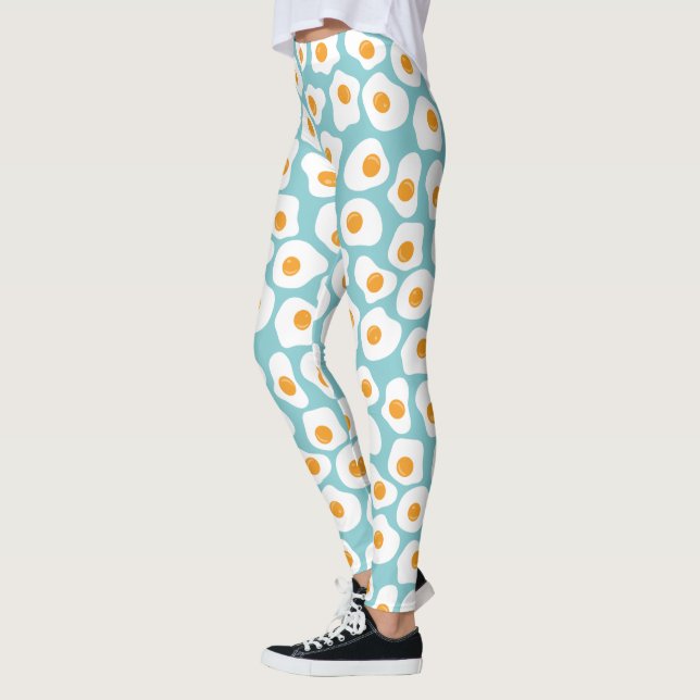 Niedliches Ei-Jolk-Muster in Aquamarin blau Leggings (Links)