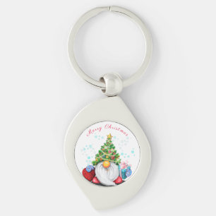Niedliches Gnome mit Weihnachtsbaumhut und Geschen Schlüsselanhänger