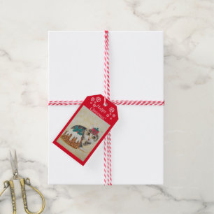niedliches graues Tabbykätzchen, das Geschenkanhänger