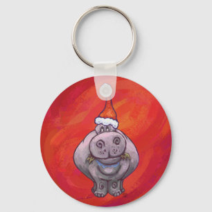 Niedliches Hippo in Weihnachtsmannmütze auf Rot Schlüsselanhänger